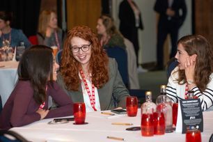 AC23 Women talking on table.jpg