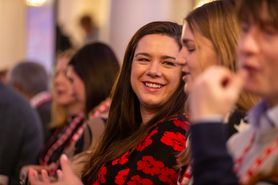 SCL24 marketing delegate in audience smiling.jpg