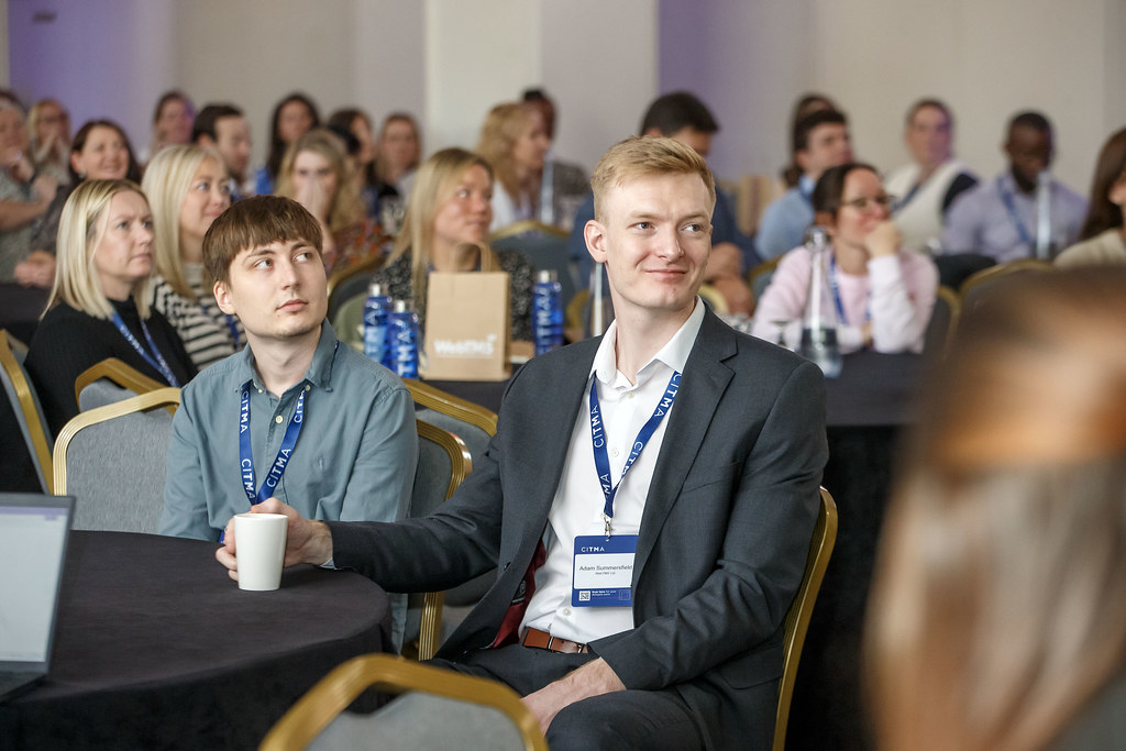 Paralegal Conference 2024 - Man smiling sitting at table - Copy.jpg