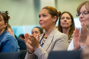 Paralegal conference woman applauding.jpg